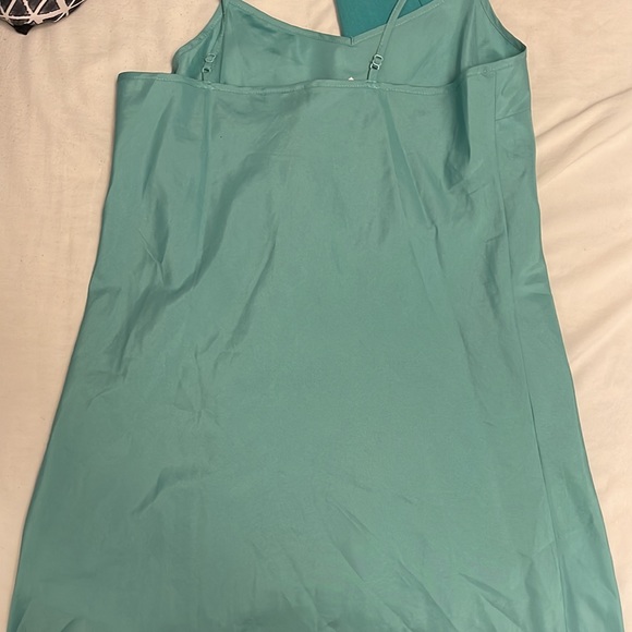 There’s a charlottes Russe coat in a medium green size M - Picture 5 of 5